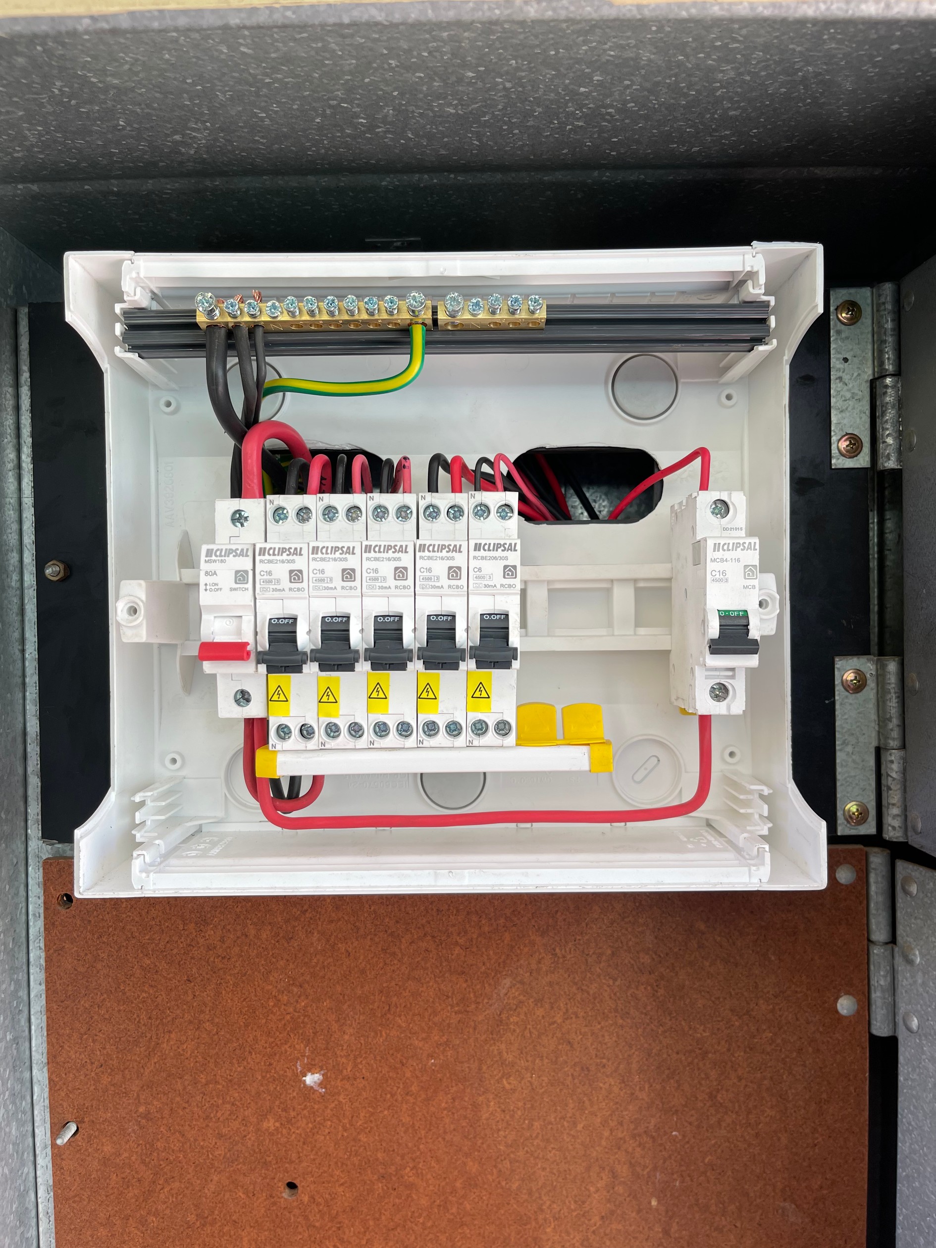 Main electrical board with switchboards, circuit breakers, and wiring installed by master electricians