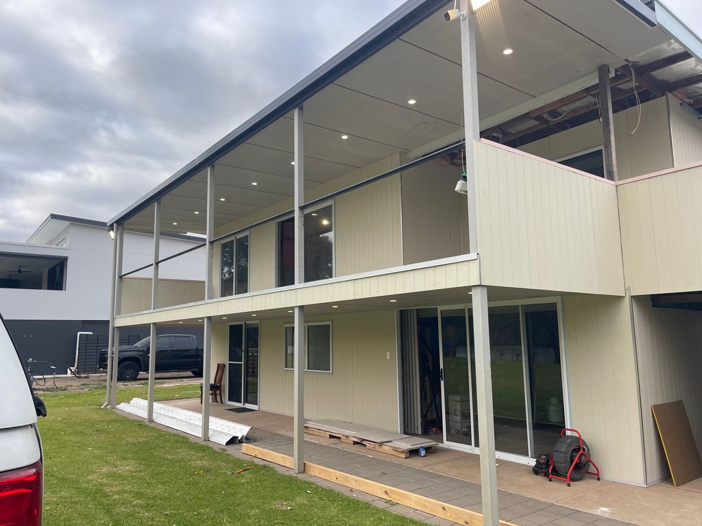 Electrician fitting lighting in renovation project with modern design in Bowhill home